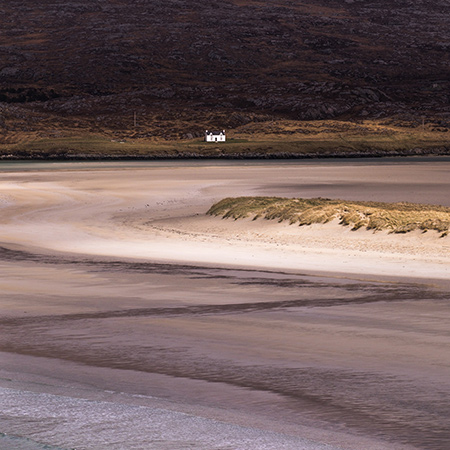 Christopher Swan: Harris in the Spring - beach with white cottage in the distance