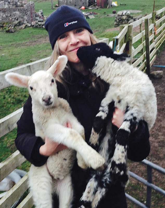 Mhairi Killin with lambs Iona